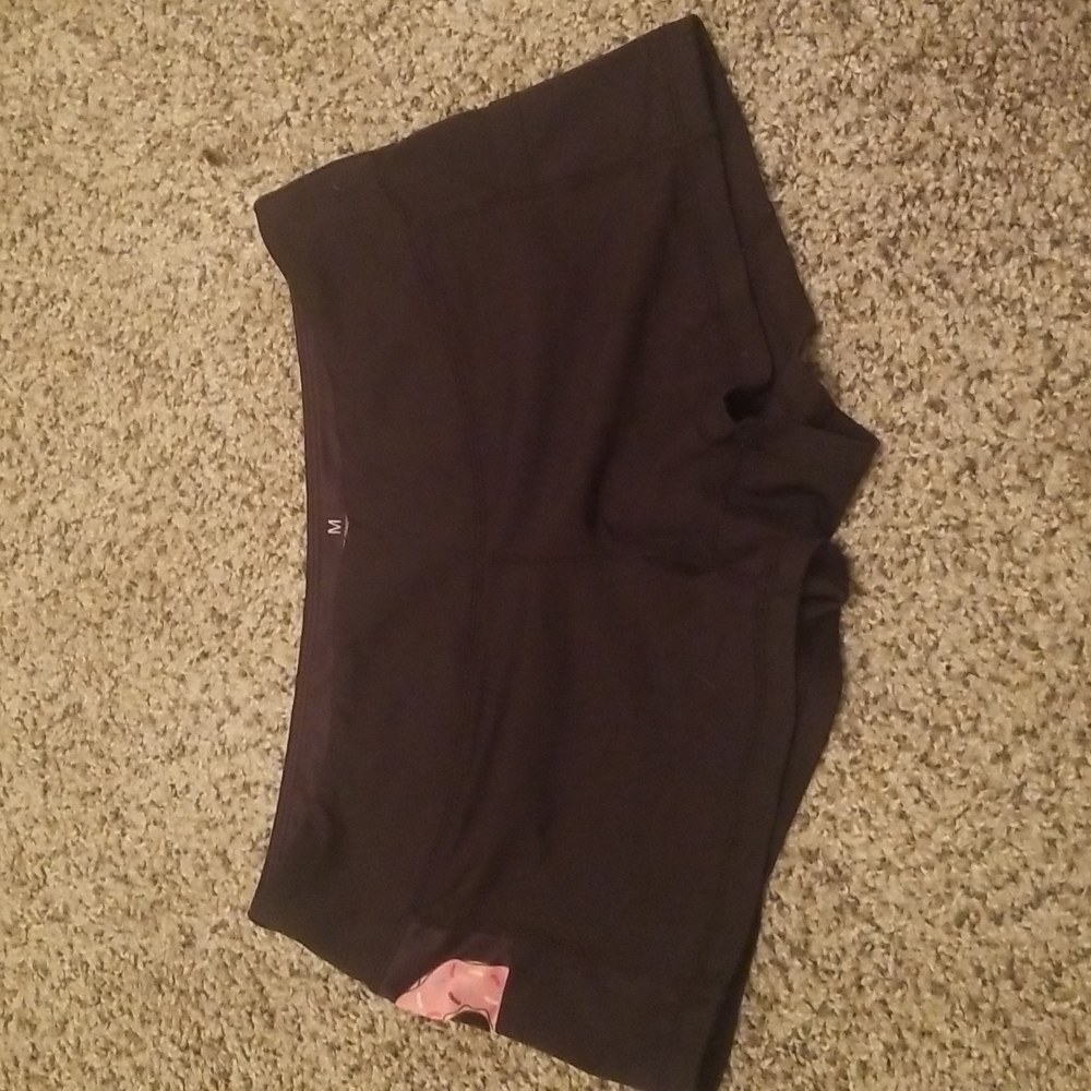 Black with donut in pocket. Feed me Fight Me shorts